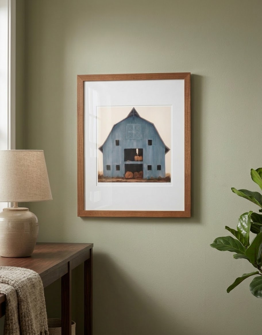 Country Living blue barn with rolls of hay
