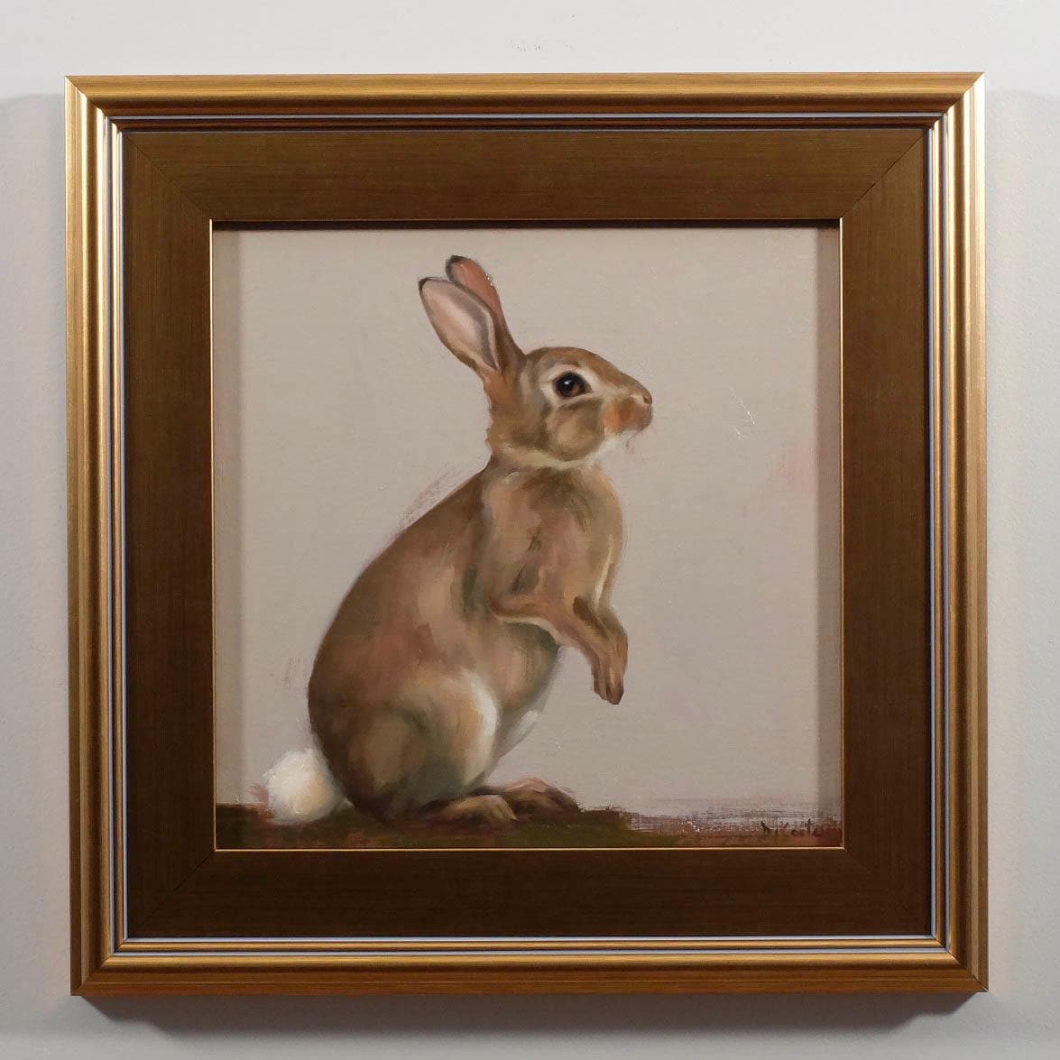 Jax bunny painting in a gold plein air frame